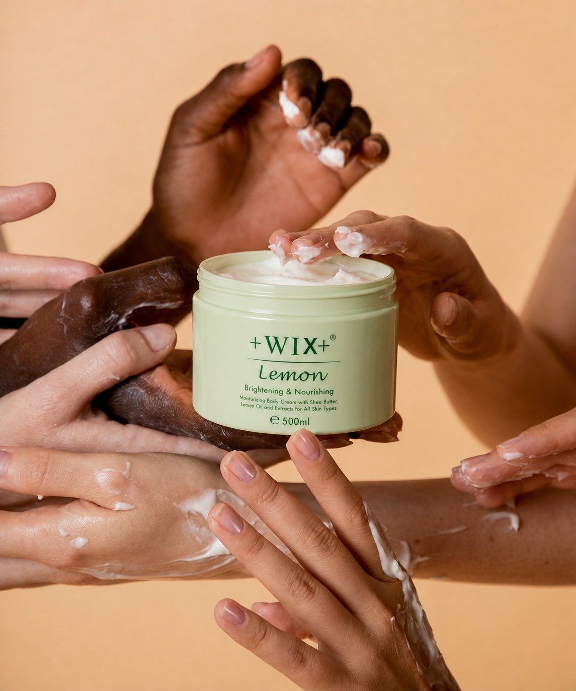 +WIX+ Lemon body cream shared between hands